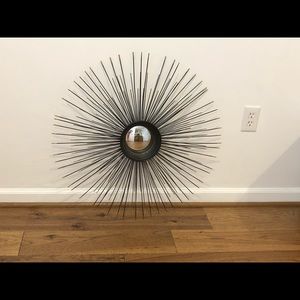 Black wall hanging with mirror